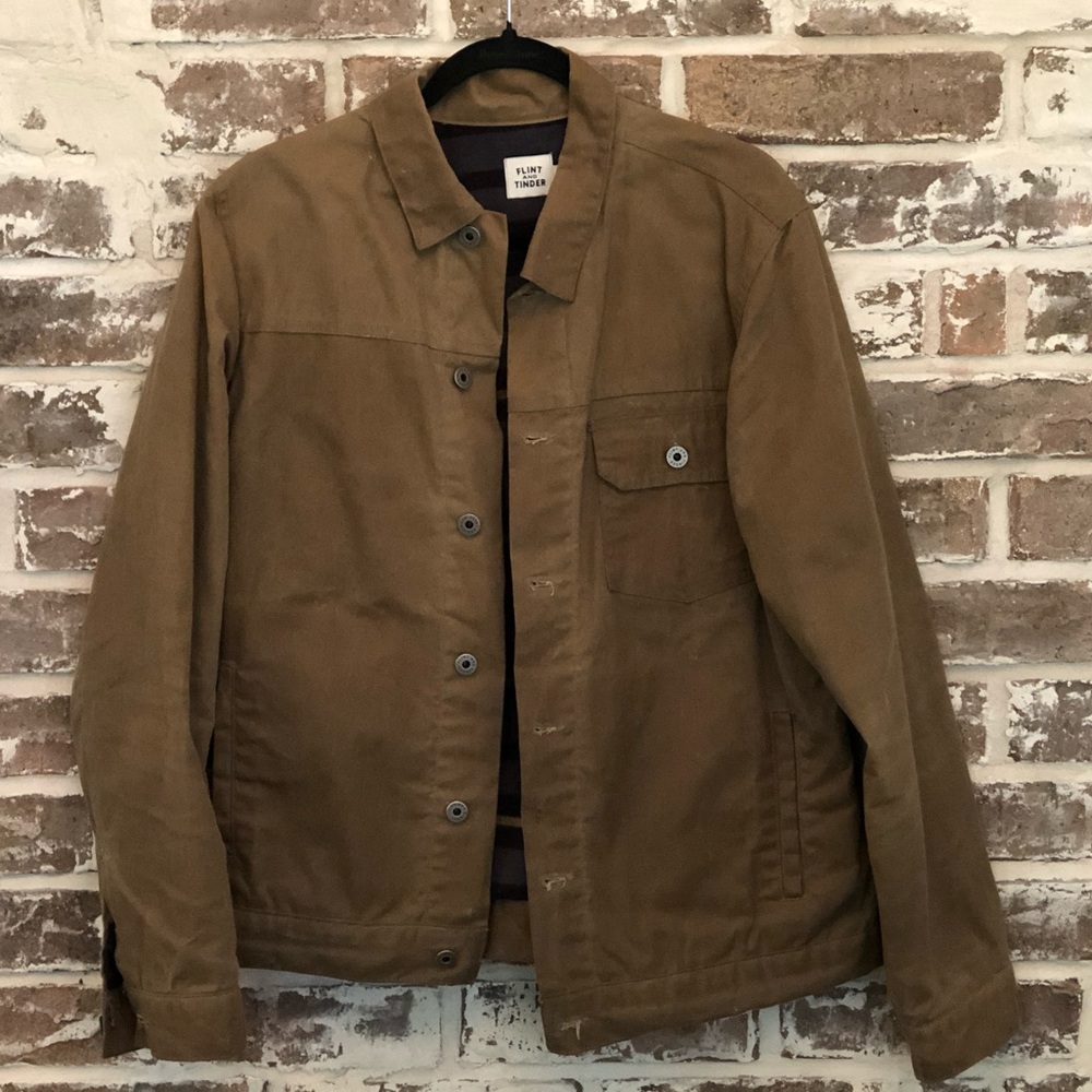 Men’s Flint and Tinder Tan Waxed Trucker Jacket. This jacket has some wear.